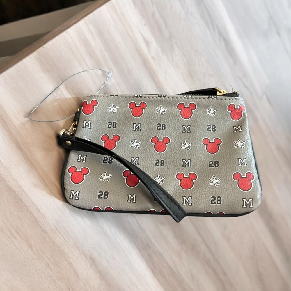 DISNEY MICKEY MOUSE WRISTLET NWOT HAS TAG HOLDER BUT NO TAG COLLEGIATE PATTERN